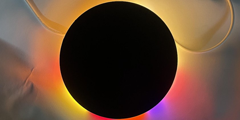 Bending the Total Eclipse