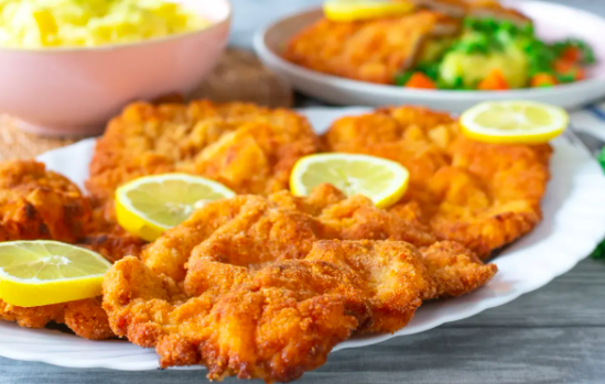 German: Pork Schnitzel, Spaetzle, Red Cabbage, Apple Strudel