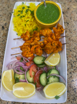 Indian: Chicken Tikka, Green Chutney, Naan, Salad, Yellow Rice, Mango Lassi