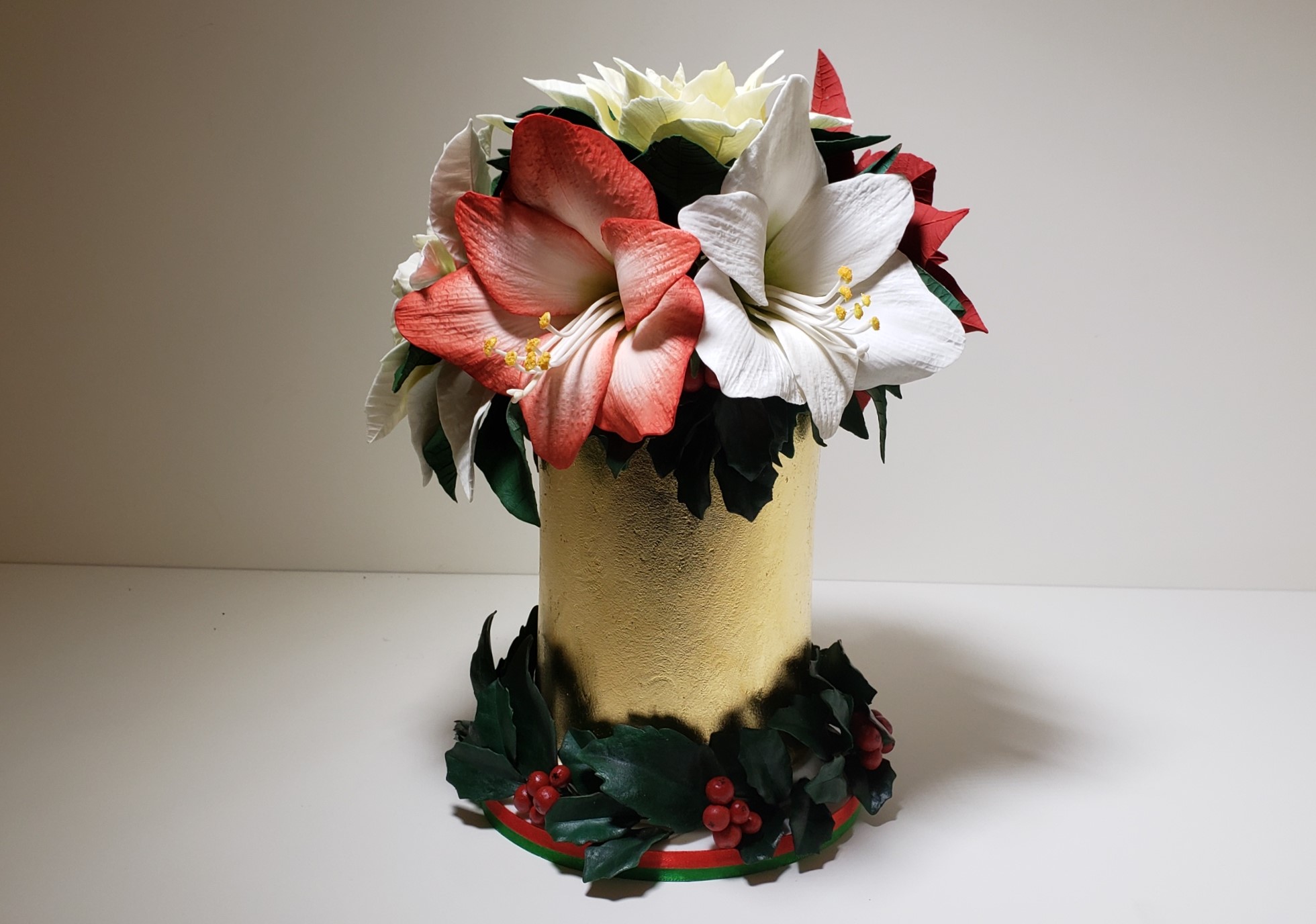 Sugar flowers. Amaryllis, Poinsettia and Holly leaves