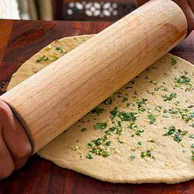 Classic Indian Cuisine: Butter Chicken and Handmade Naan