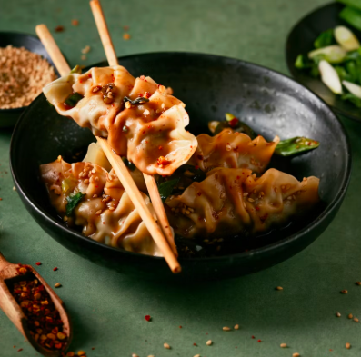 Chili Crisp Wonton Dumplings & Cucumber Salad